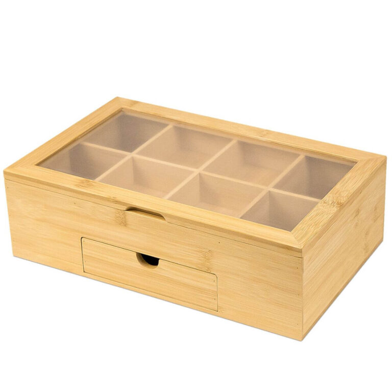 8-compartment bamboo tea bag organizer with clear lid and bottom drawer, left side view on white background.