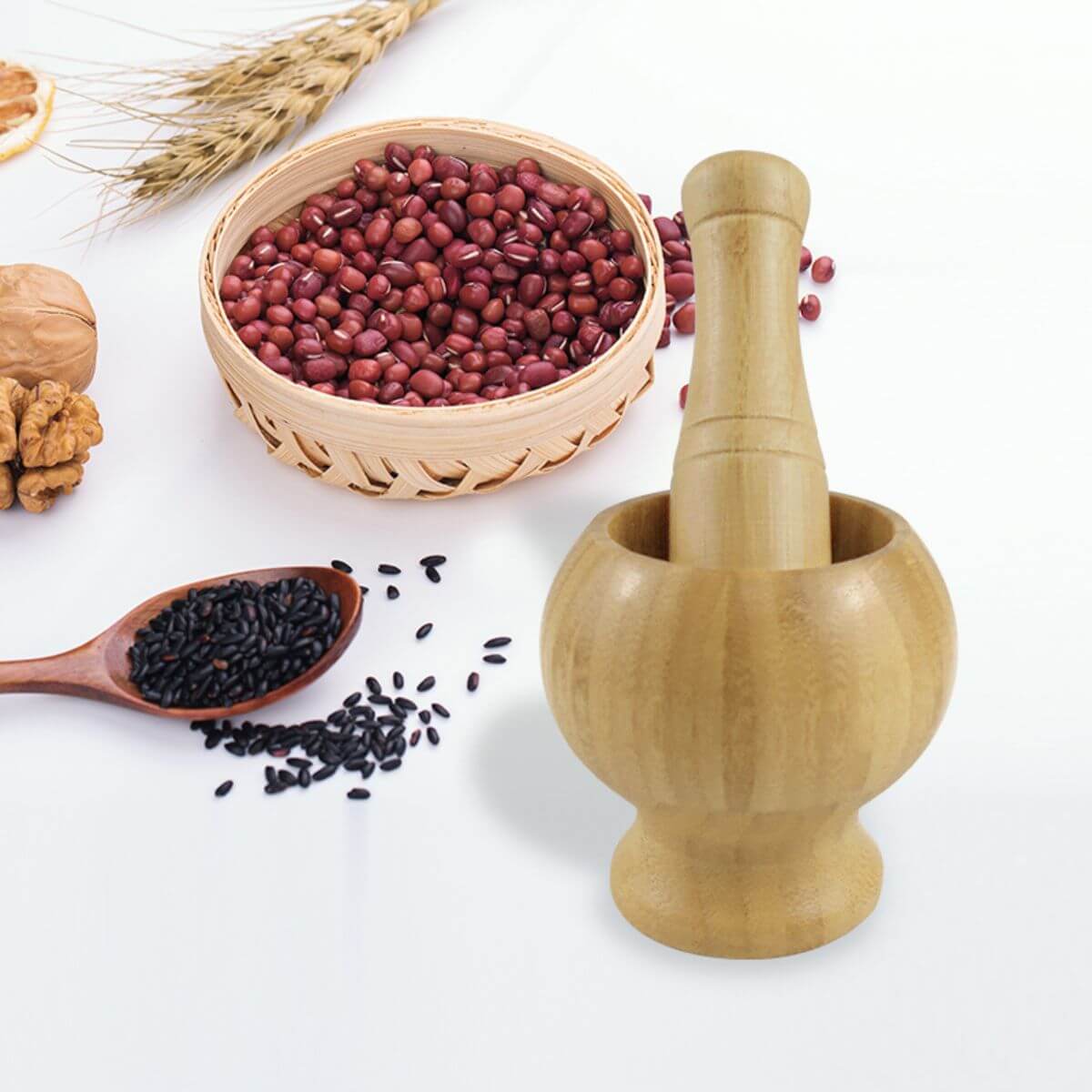 Medium bamboo mortar and pestle used for crushing red beans and sesame.