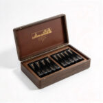 Walnut MDF multi-purpose storage box with magnetic closure, front view on white background.